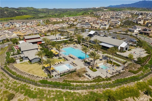 aerial view featuring a residential view and a mountain view