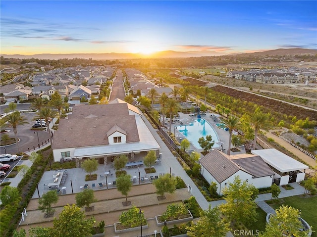 birds eye view of property with a residential view