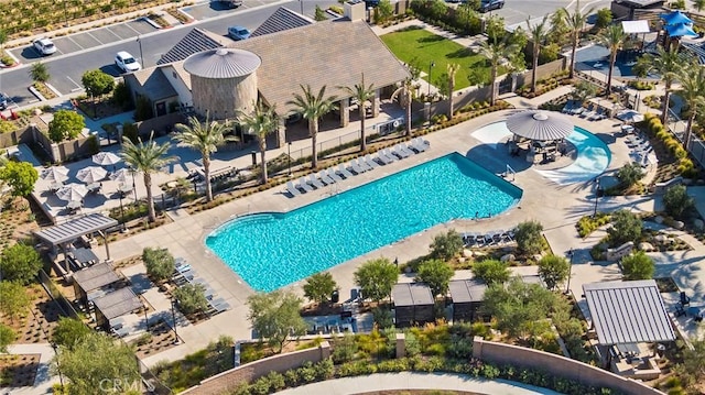 view of pool featuring fence