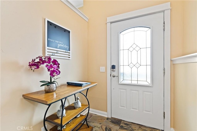 foyer entrance with baseboards