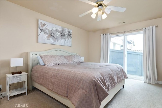 bedroom with carpet flooring, a ceiling fan, visible vents, and access to outside