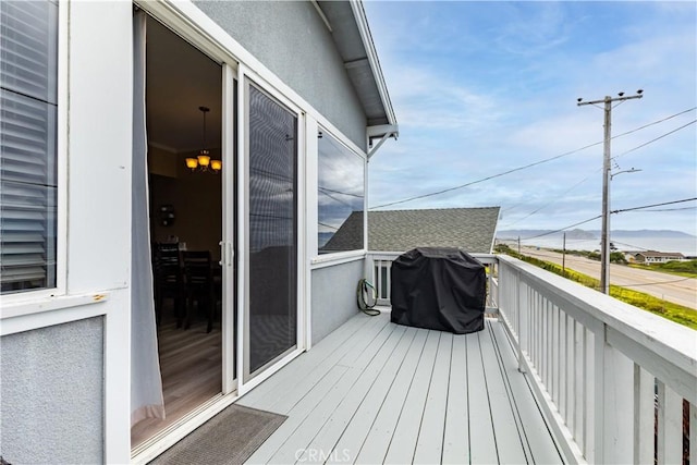 balcony featuring area for grilling