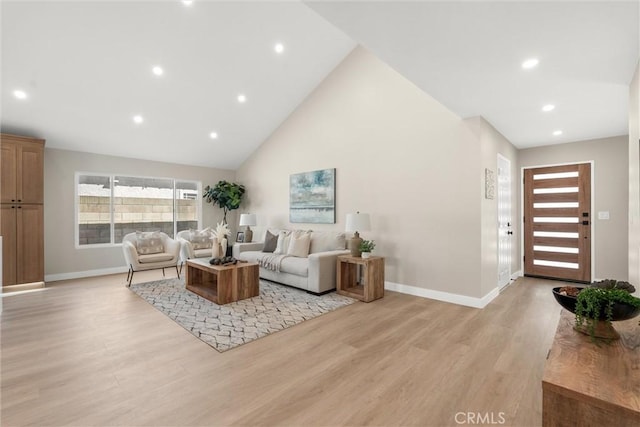 living room with light wood-type flooring, baseboards, high vaulted ceiling, and recessed lighting