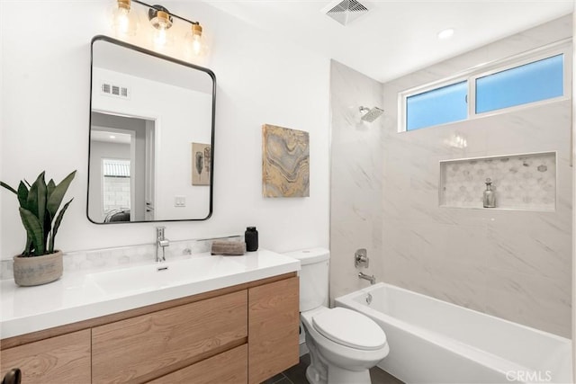 bathroom featuring toilet, shower / bathing tub combination, vanity, and visible vents