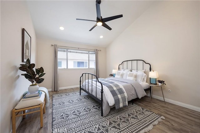 bedroom featuring ceiling fan, baseboards, vaulted ceiling, and wood finished floors