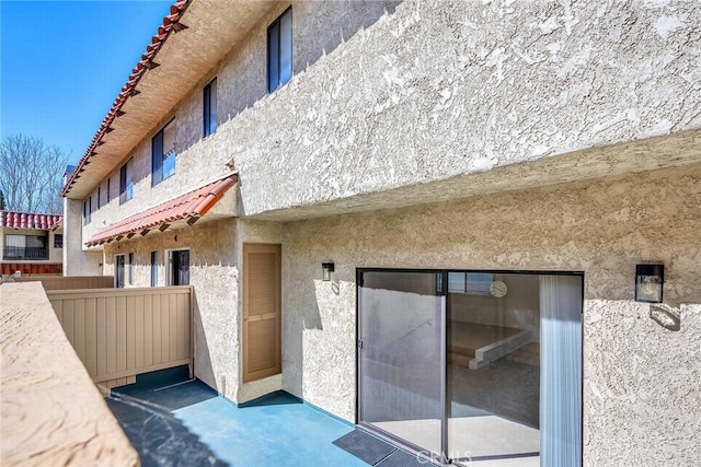 exterior space with stucco siding