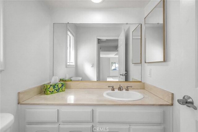 half bath with toilet and vanity