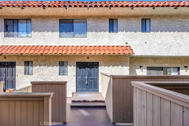 exterior space with stucco siding