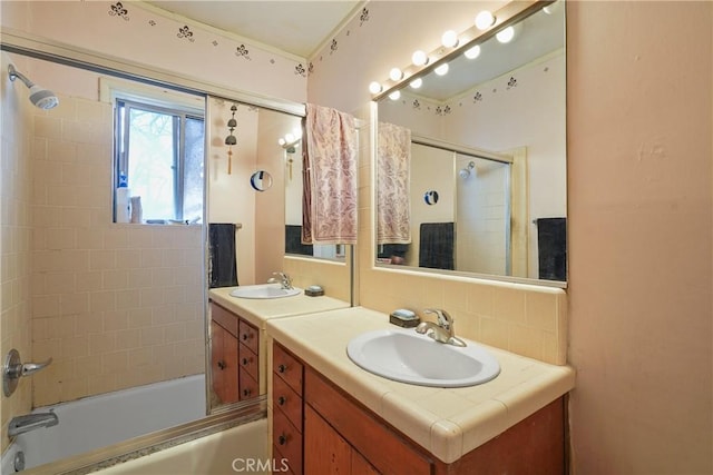 full bathroom with combined bath / shower with glass door and vanity