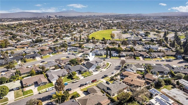 aerial view featuring a residential view and a mountain view