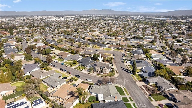 bird's eye view with a residential view and a mountain view