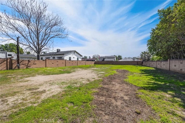 view of yard with fence