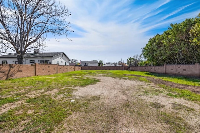 view of yard with fence