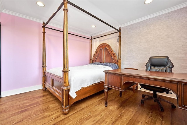 bedroom featuring baseboards, recessed lighting, light wood-style flooring, and crown molding