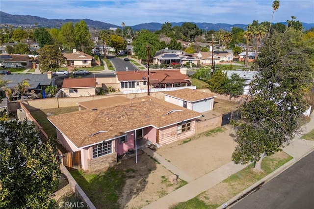 bird's eye view with a residential view and a mountain view