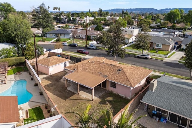 aerial view with a mountain view and a residential view