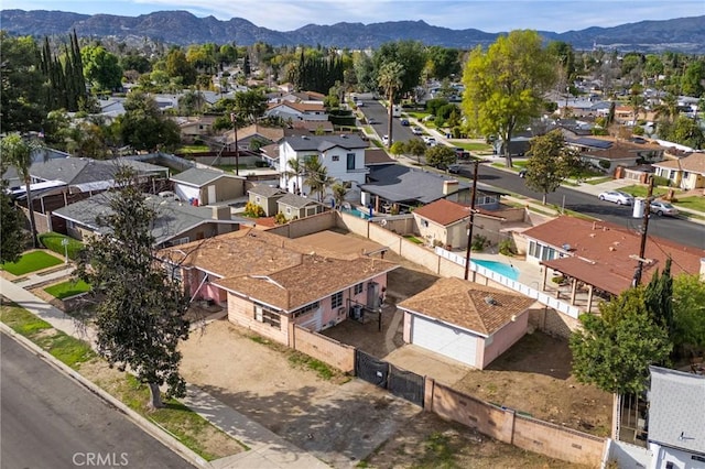 bird's eye view featuring a residential view and a mountain view