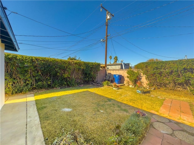 view of yard featuring a fenced backyard