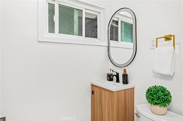 half bath with toilet and vanity