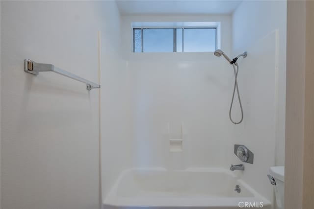 full bathroom featuring toilet and washtub / shower combination