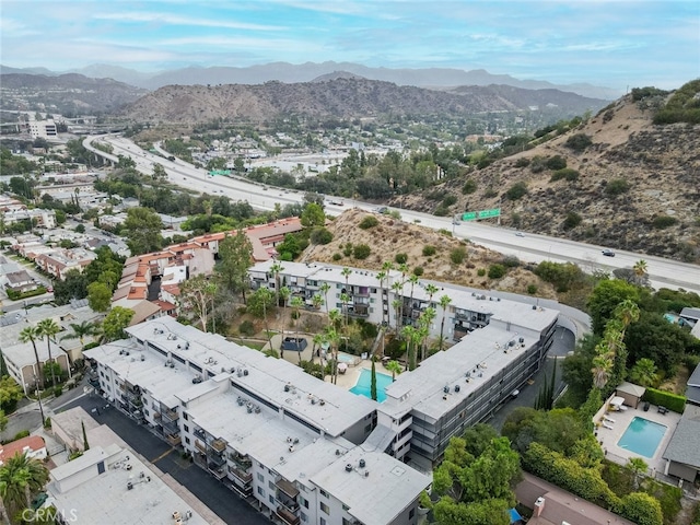 drone / aerial view featuring a mountain view