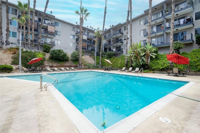 community pool featuring a patio