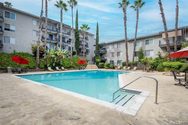 pool with a patio