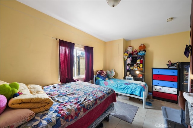 bedroom featuring tile patterned floors