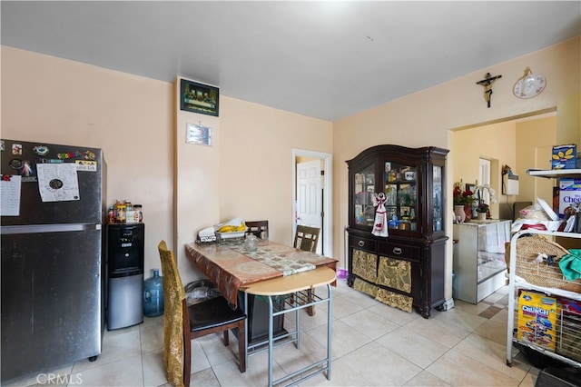 dining area with tile patterned flooring