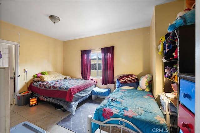 bedroom featuring tile patterned floors