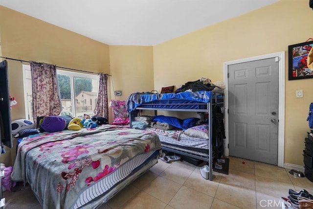 bedroom featuring tile patterned floors