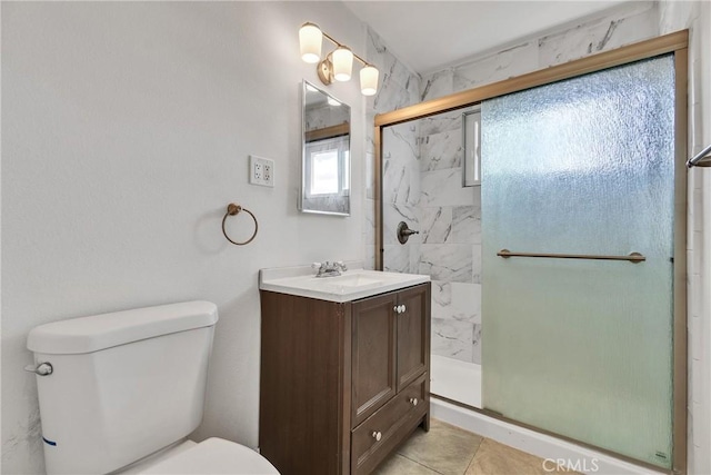 full bathroom with vanity, a marble finish shower, and toilet