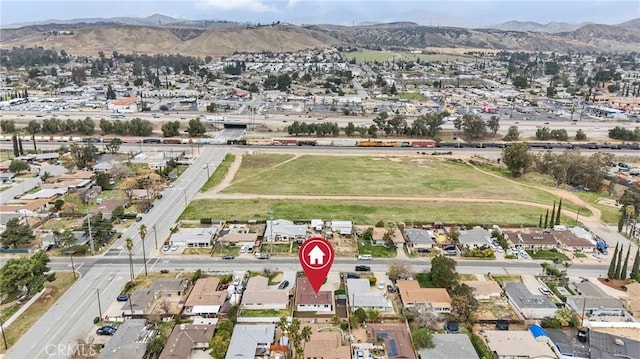 birds eye view of property featuring a residential view and a mountain view