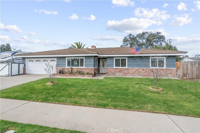 ranch-style home featuring a garage, fence, driveway, and a front lawn