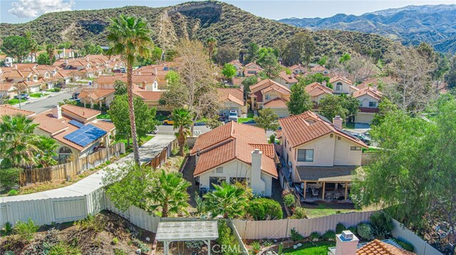 drone / aerial view with a mountain view and a residential view