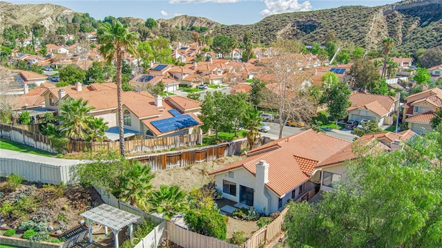 birds eye view of property with a residential view and a mountain view