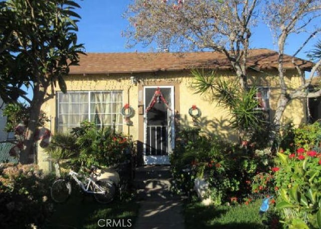 view of front of home with stucco siding