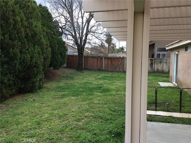 view of yard with fence