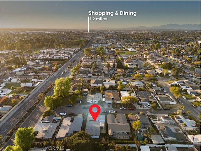 birds eye view of property with a residential view and a mountain view