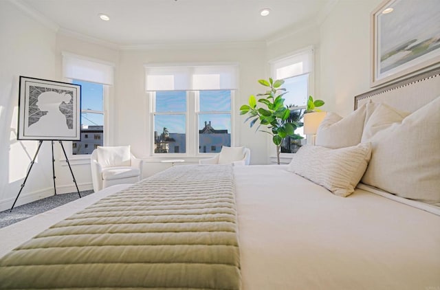 carpeted bedroom with ornamental molding, recessed lighting, multiple windows, and baseboards