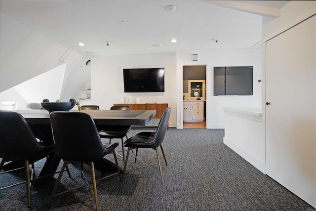 carpeted dining space featuring recessed lighting and baseboards