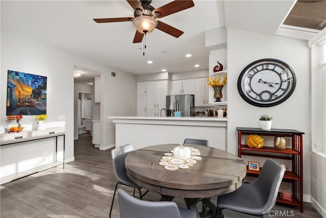 dining room with recessed lighting, visible vents, ceiling fan, wood finished floors, and baseboards