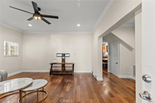 sitting room featuring visible vents, ornamental molding, hardwood / wood-style floors, recessed lighting, and baseboards