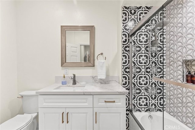 full bathroom with vanity, toilet, and tub / shower combination