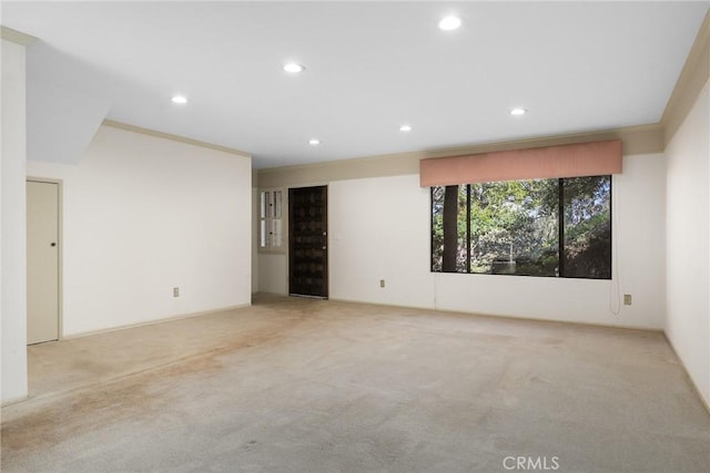 carpeted spare room with recessed lighting