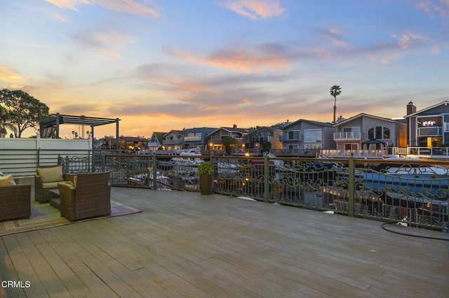 wooden deck featuring a residential view