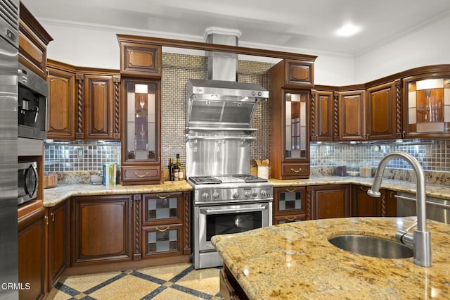 kitchen with crown molding, tasteful backsplash, appliances with stainless steel finishes, a sink, and light stone countertops