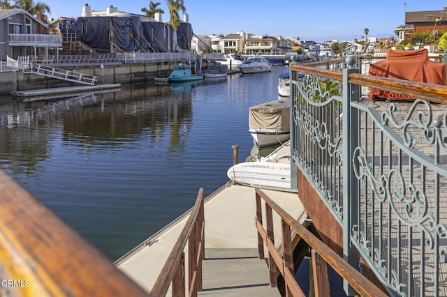 view of dock with a water view