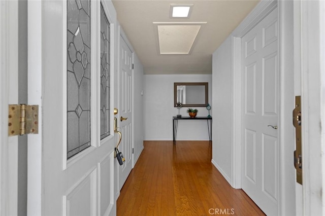 hallway with wood finished floors