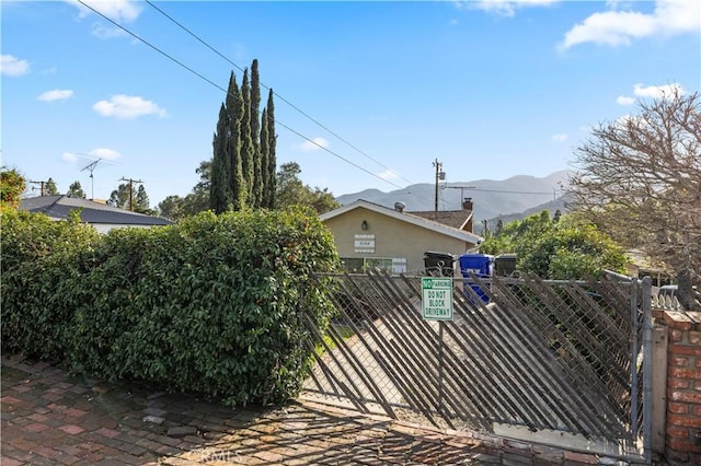 3104 Altura Ave, La Crescenta, CA 91214 - view of front of property featuring a mountain view, a gate, and stucco siding